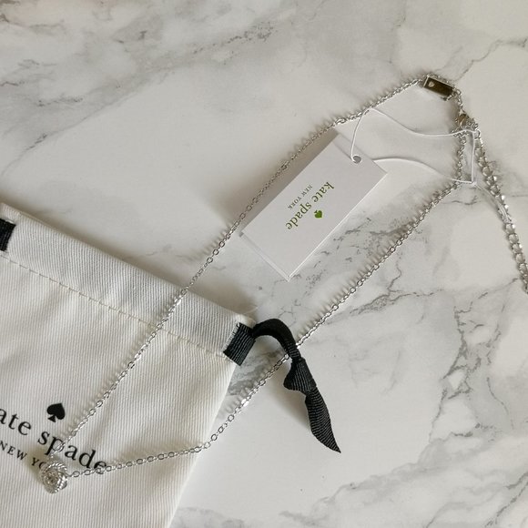 NWT KATE SPADE INFINITY BEYOND KNOT MINI PENDANT SILVER W DUST BAG - Picture 2 of 3